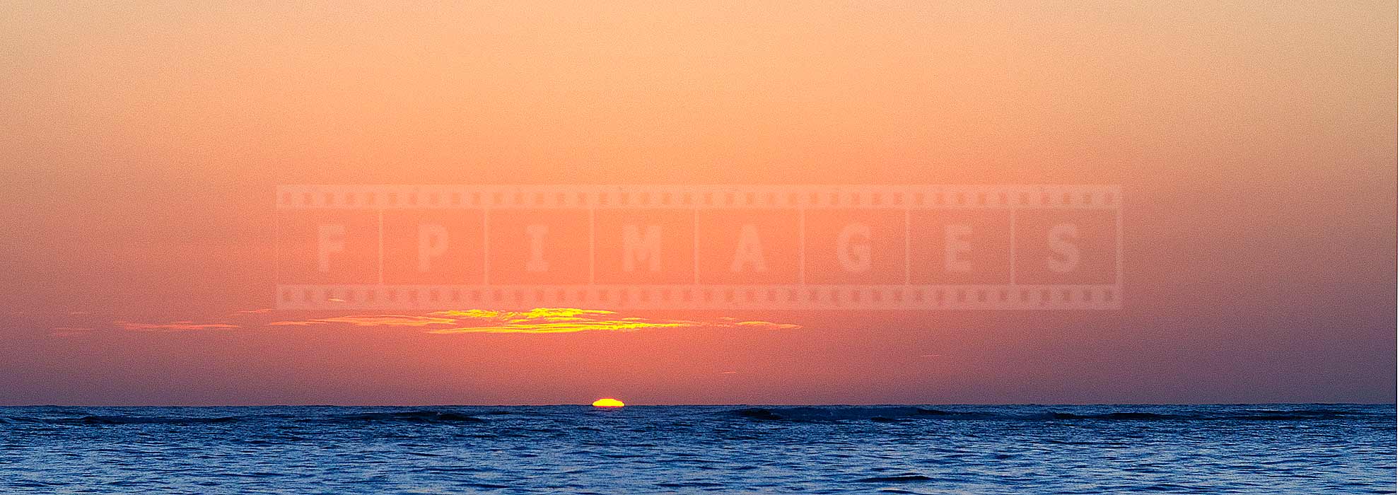 sun rising above the ocean in punta cana